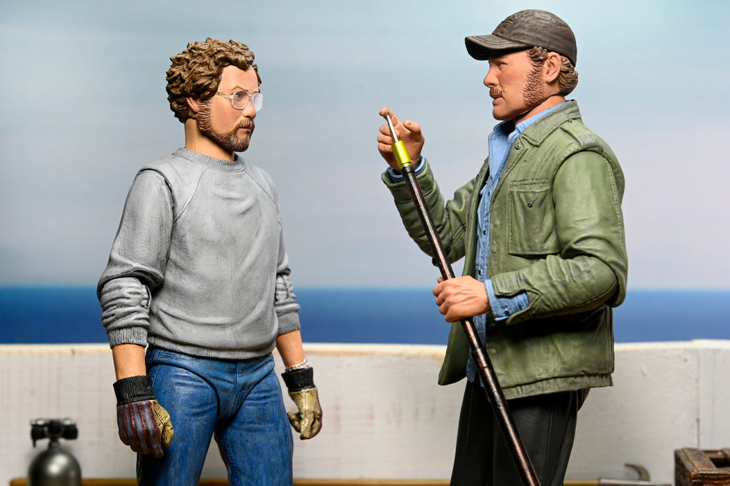 NECA Figura de Accion Ultimate: Jaws 50 Aniversario - Matt Hooper Amity Arrival 7 Pulgadas