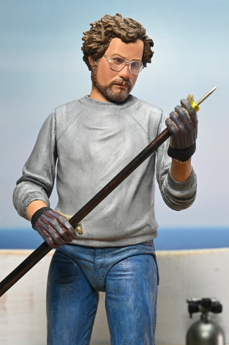 NECA Figura de Accion Ultimate: Jaws 50 Aniversario - Matt Hooper Amity Arrival 7 Pulgadas