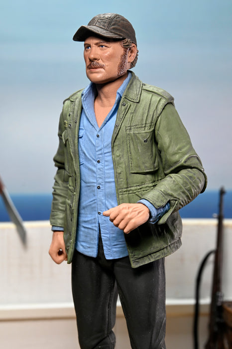 NECA Figura de Accion Ultimate: Jaws 50 Aniversario - Sam Quint 7 Pulgadas