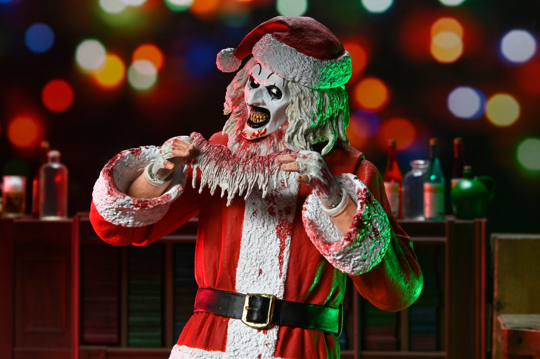 NECA Figura de Accion Ultimate: Terrifier 3 - Santa Suit Art the Clown Bloody Version 7 Pulgadas
