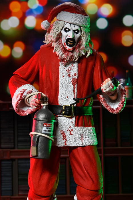 NECA Figura de Accion Ultimate: Terrifier 3 - Santa Suit Art the Clown Bloody Version 7 Pulgadas