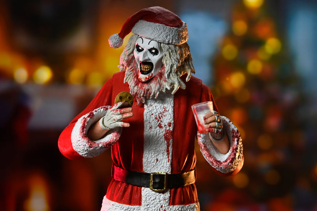 NECA Figura de Accion Ultimate: Terrifier 3 - Santa Suit Art the Clown Bloody Version 7 Pulgadas