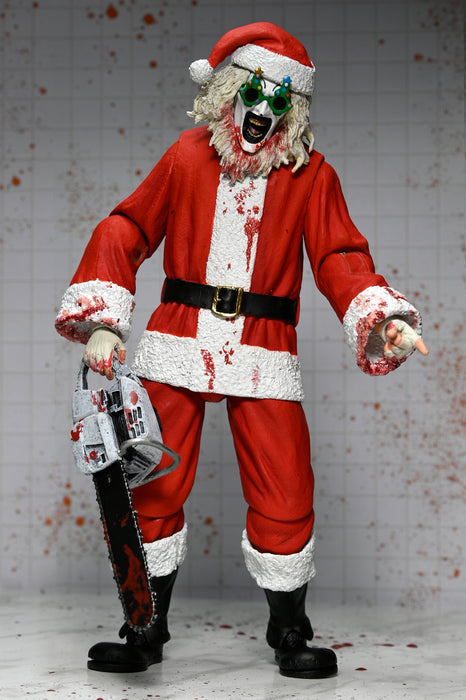 NECA Figura de Accion Ultimate: Terrifier 3 - Santa Suit Art the Clown Bloody Version 7 Pulgadas