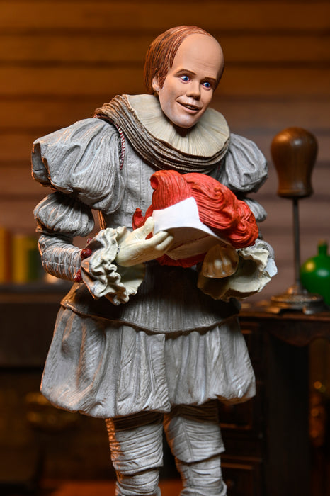 NECA Figura de Accion Ultimate: Welcome to Derry - Bob Gray como Pennywise 7 Pulgadas