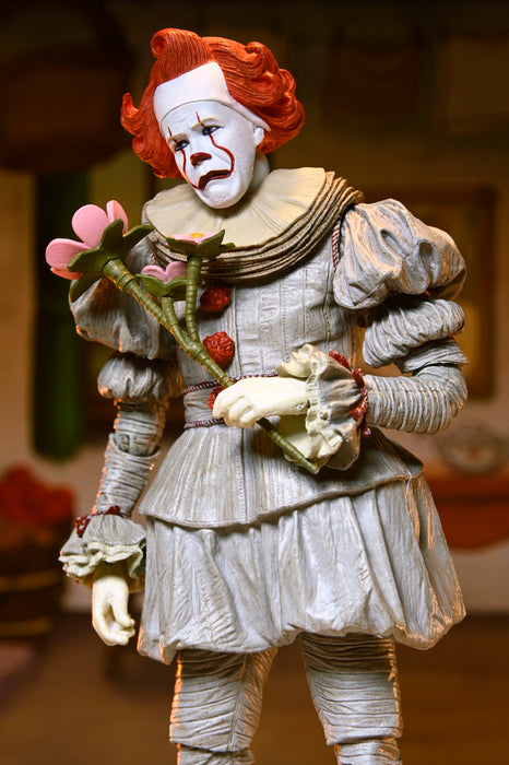 NECA Figura de Accion Ultimate: Welcome to Derry - Bob Gray como Pennywise 7 Pulgadas