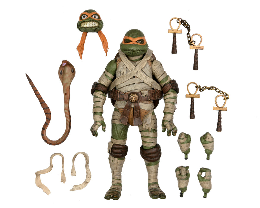 NECA Figura de Accion Ultimate: Universal Monsters x TMNT - Michelangelo como Momia 7 Pulgadas