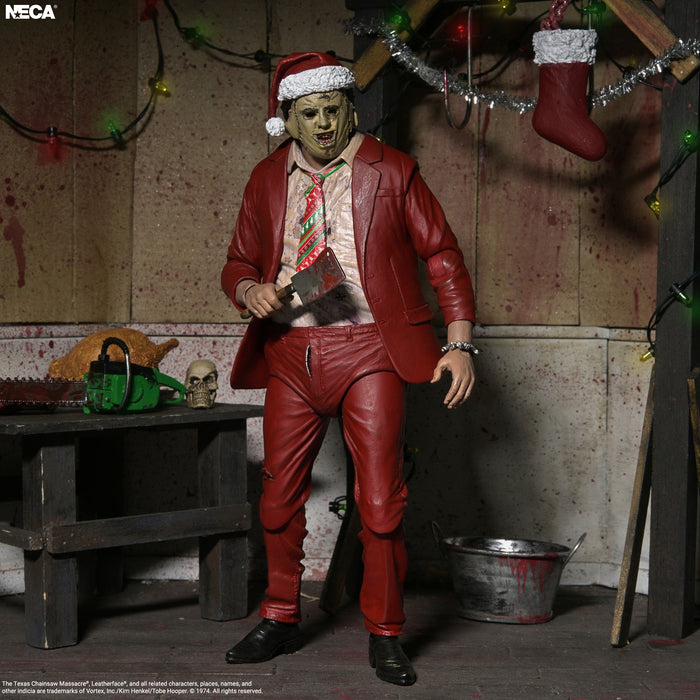 NECA Figura de Accion Ultimate: Texas Chainsaw Massacre - Santa Leatherface 7 Pulgadas