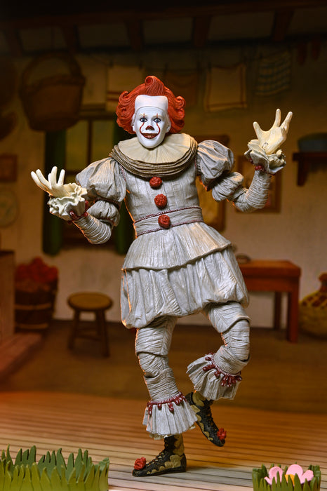 NECA Figura de Accion Ultimate: Welcome to Derry - Bob Gray como Pennywise 7 Pulgadas