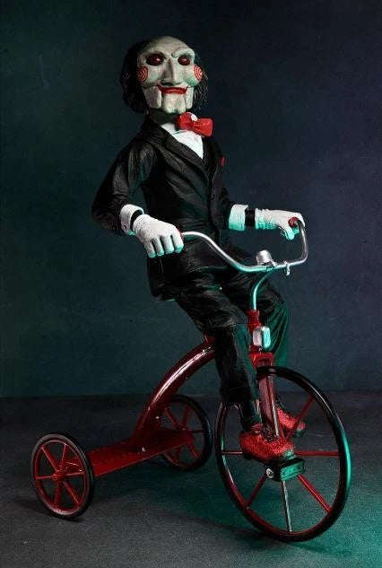 NECA Figura de Accion: Saw - Billy en Triciclo con Sonido 12 Pulgadas